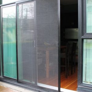 A sliding patio screen door