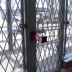 A folding security door over a Victoria BC business
