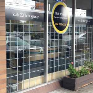 A custom window barrier at a business in Victoria BC