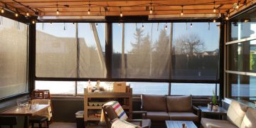 A picture of a large window opening retractable window screen