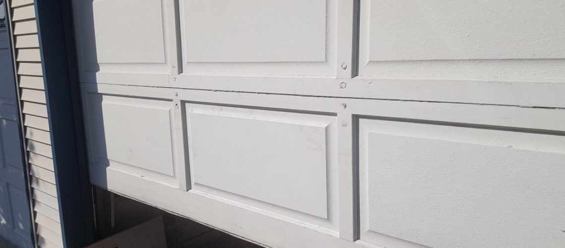 can-you-replace-garage-door-panel